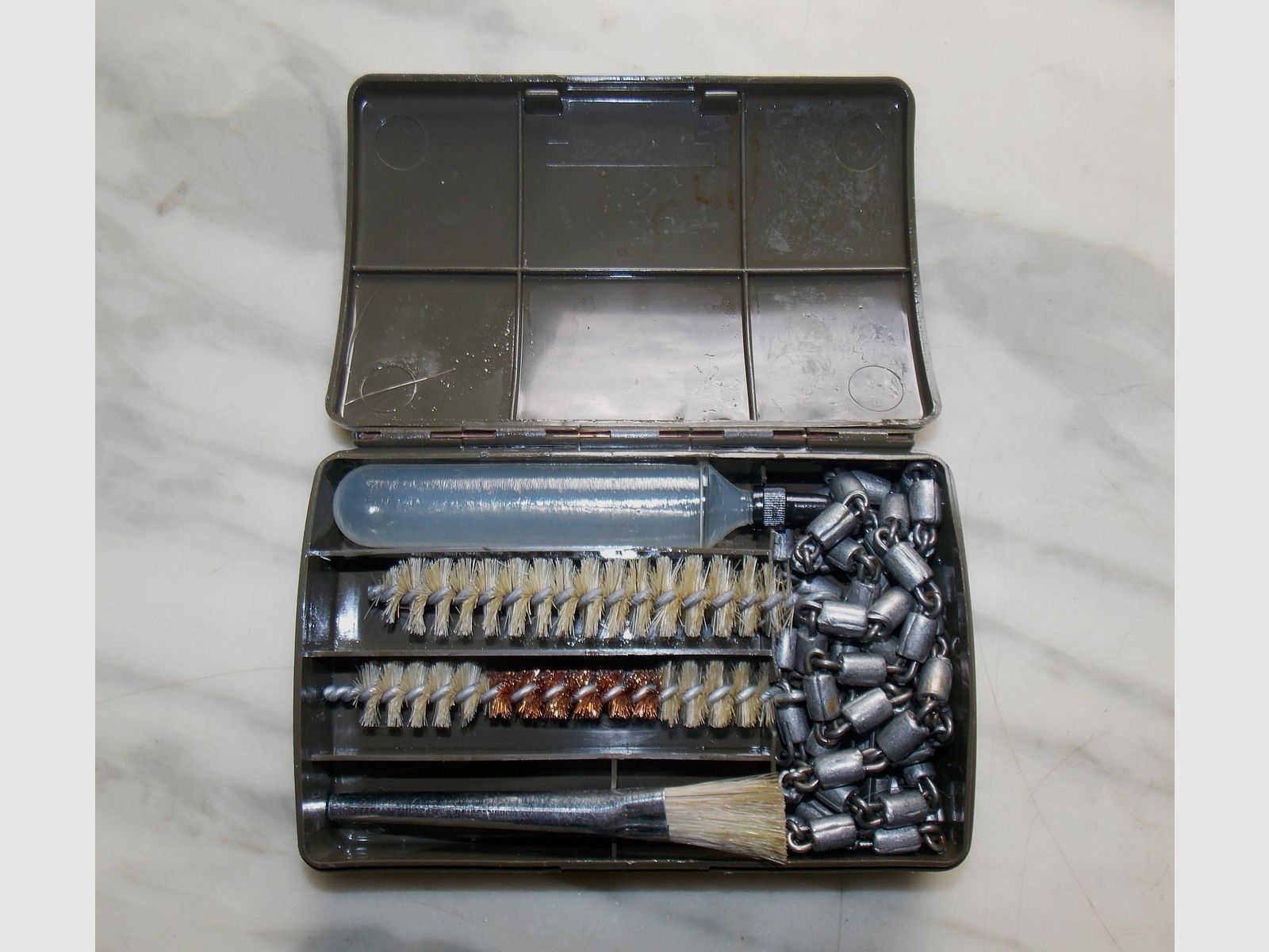 Cleaning device for rifle