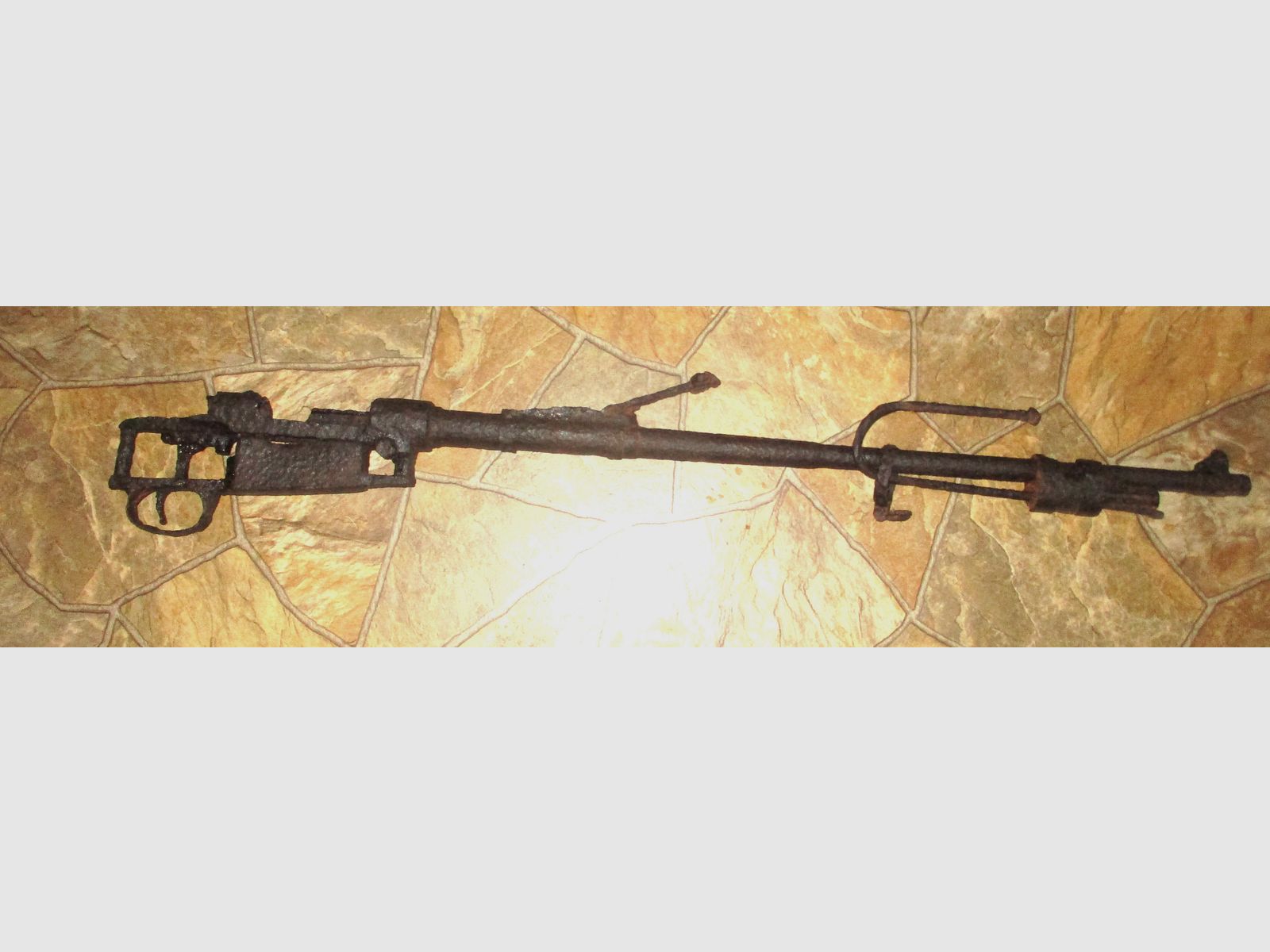 old rifle from World War I or II, decorative barn find