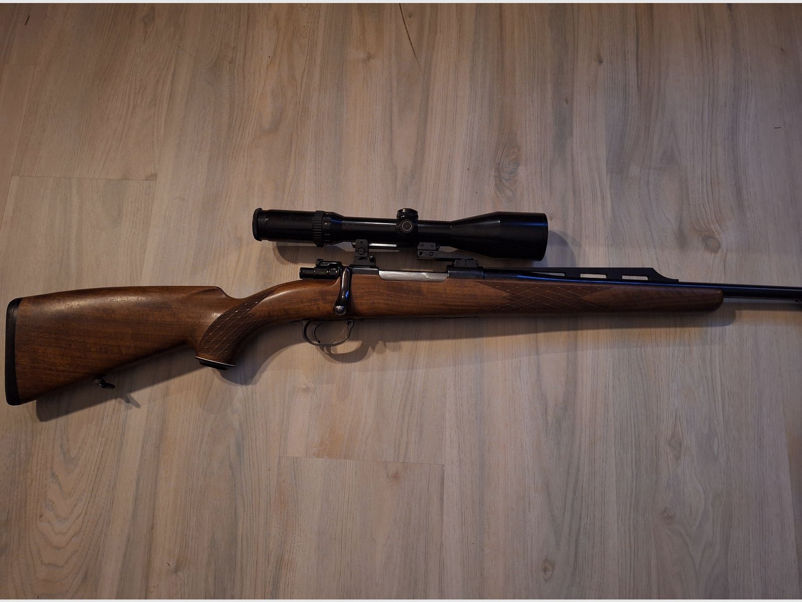 Repeater rifle based on Mauser 98 including scope 3-12x50
