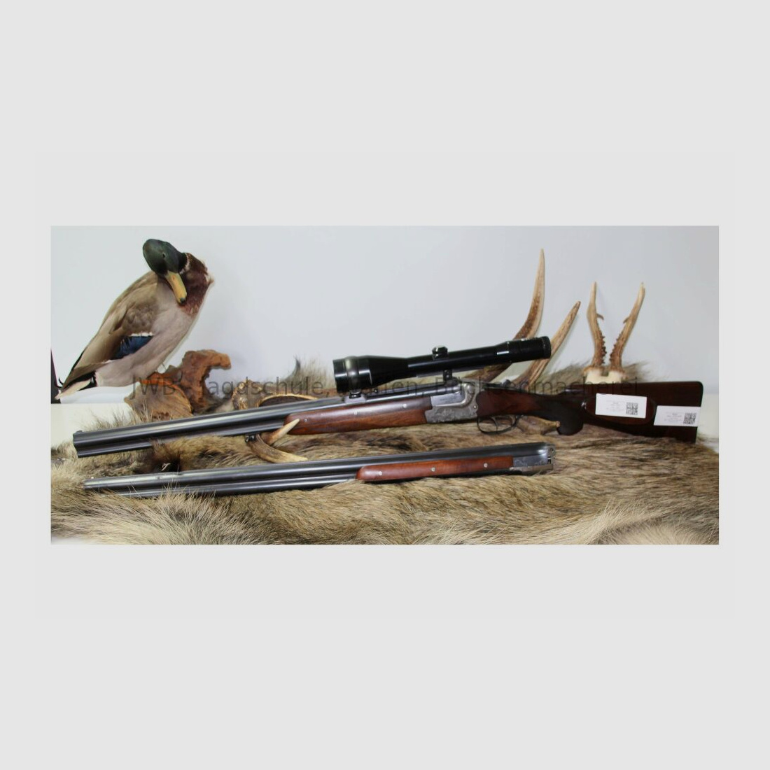 Merkel double-barreled shotgun with interchangeable double-barrel and variable sight 12/70; 7x57R