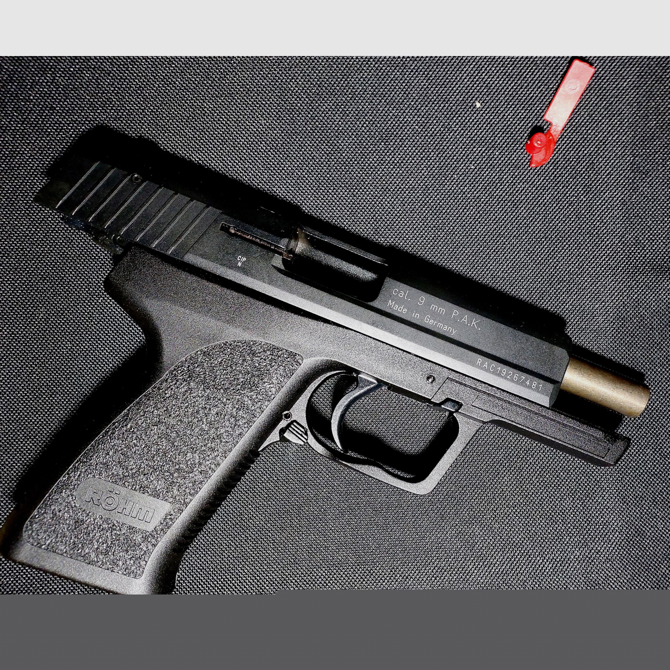 Pistolet alarmowy Röhm RG96, oksydowany (PTB 699) Zestaw RG 96 z tłumikiem, pomocą do ładowania i 2 magazynkami