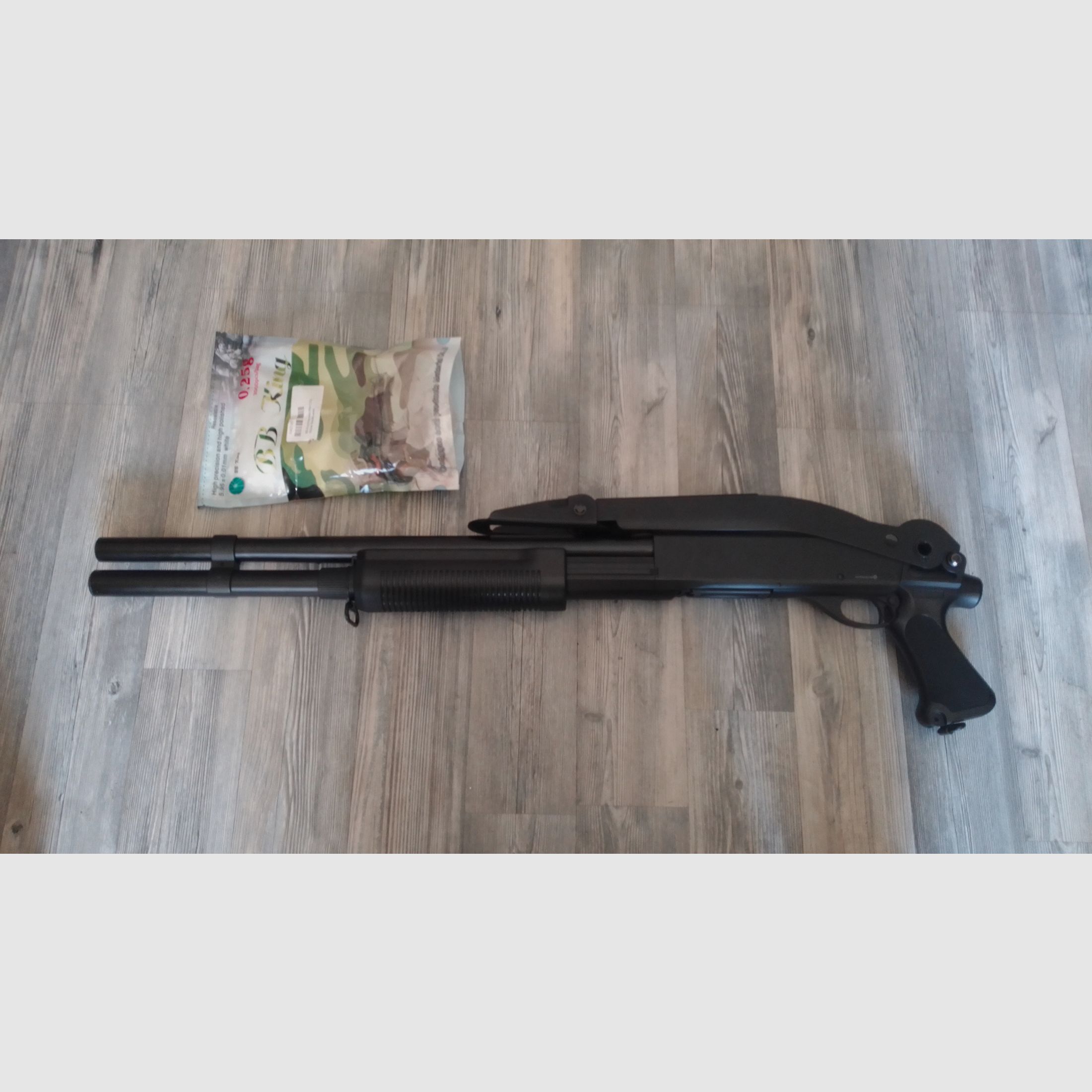 Softair Schrotflinte / Shotgun -  Cyma M870 Shotgun mit Stahl-Klappschaft Long-Type Tri-Barrel Vollmetall Springer 6mm BB schwarz  