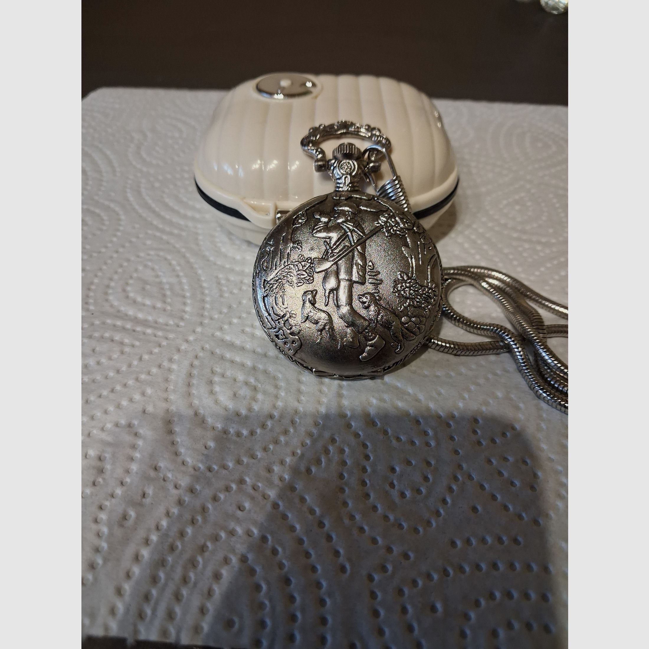 Pocket watch with hunting motif