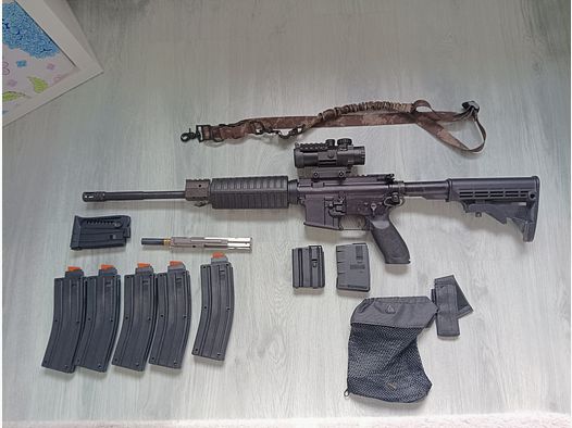Sig Sauer M 400 223 Rem con sistema de inserción para 22 LR.