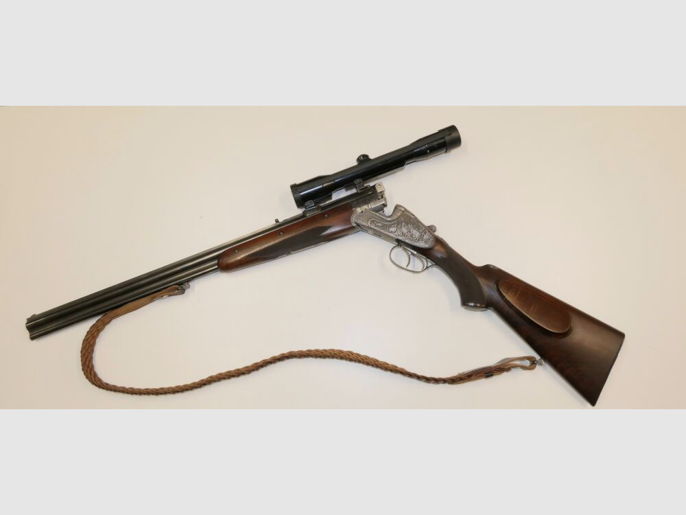Merkel E313 mit jagdlichen Tiergravuren