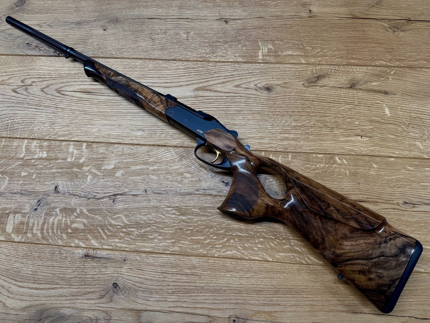 Blaser K95 Success / Holzklasse 6 / Kal. 6,5 Creedmoor / LL 47 cm / Goldelemente / M15x1