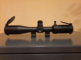 FALKE 4-16x44 TAC riflescope with 0.05 MRAD click adjustment, incl. case and accessories.