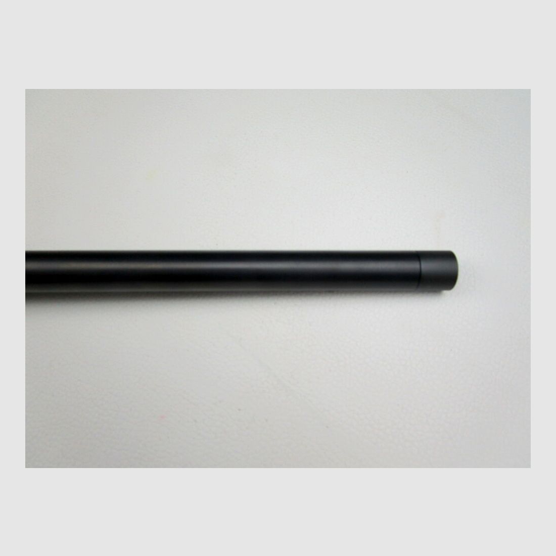 Mauser 25 Extreme with scope and silencer