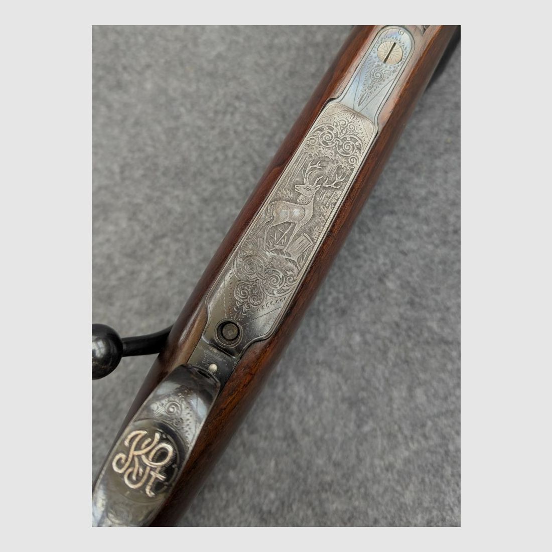 Mauser Mod 98 with animal engraving and stalking safety