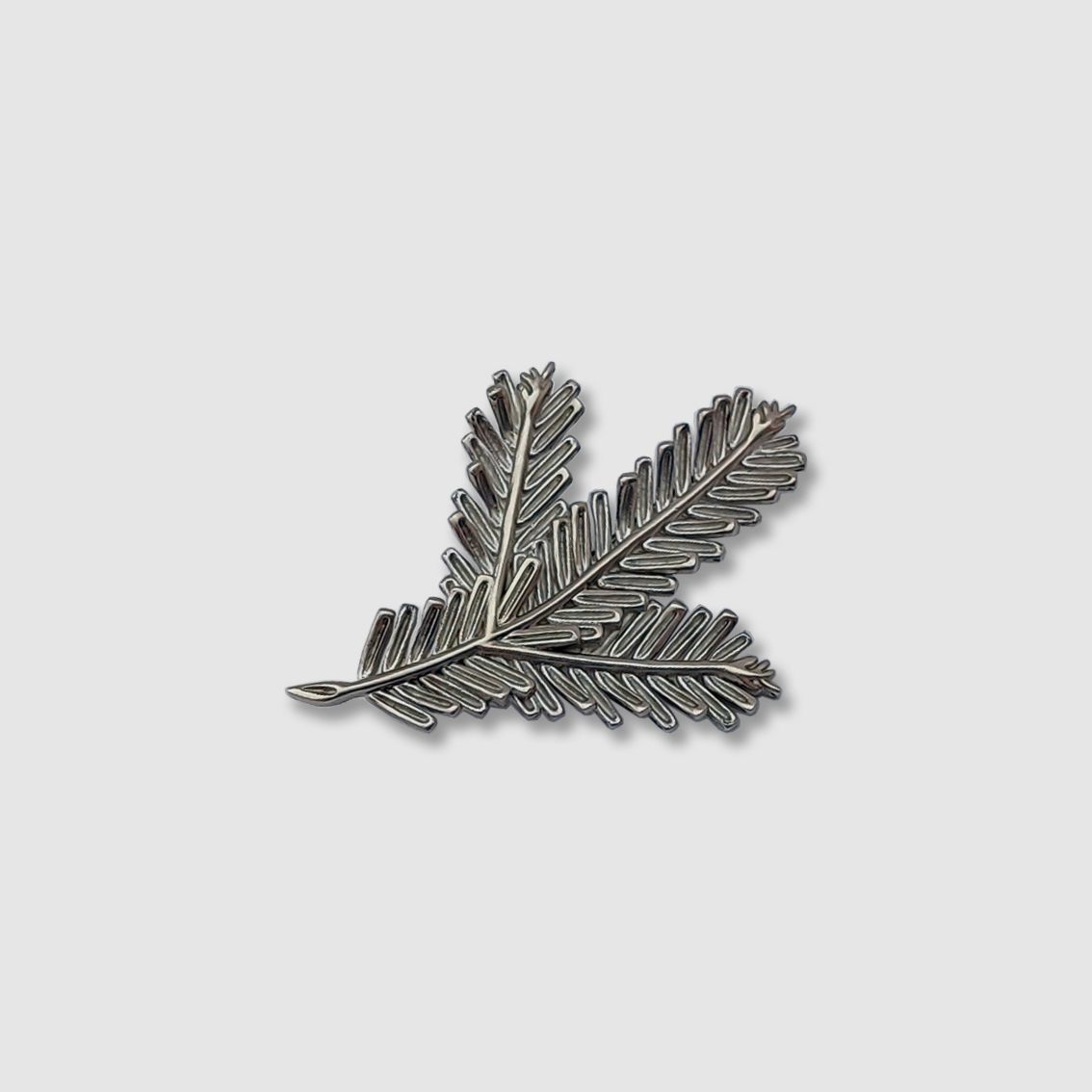 Der Bruch aus Silber: ein Jagdabzeichen für den Hut