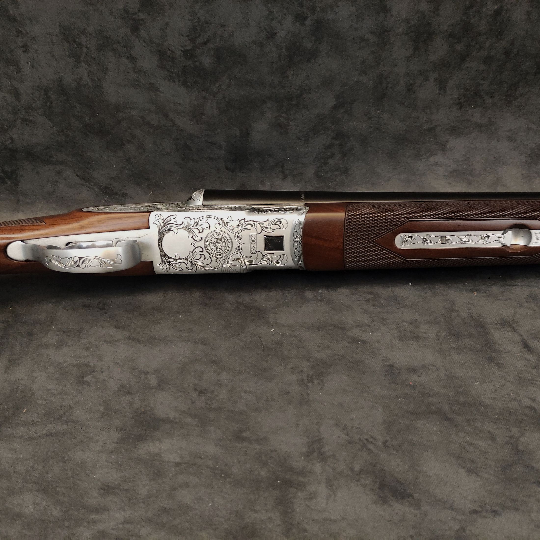 Huglu	 Huglu Kal.12/76  Mod.200AC Silber voll Graviert "Coachgun"