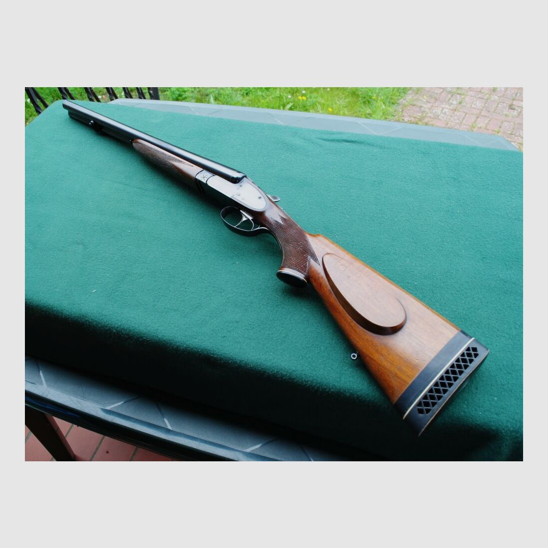 CAS escopeta de caza, auténticos cerrojos laterales, sin extractores, seguro manual.