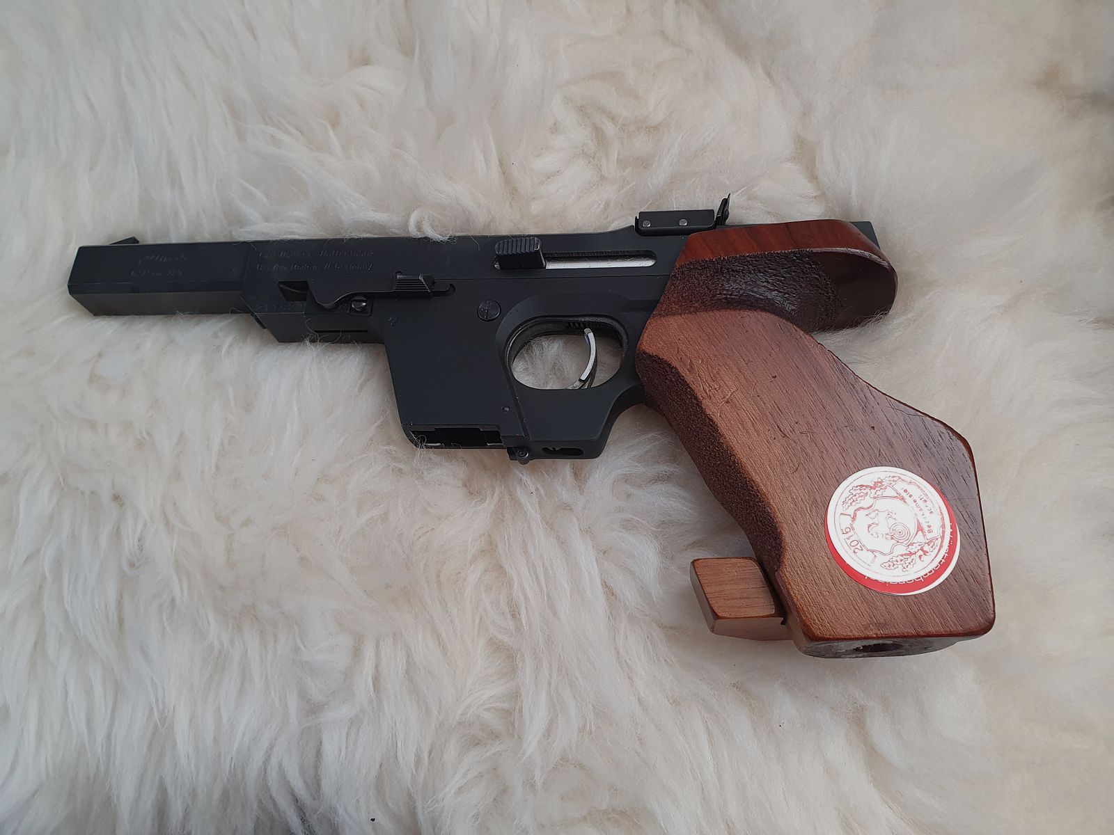 KK Anschütz sports shooting rifle .22 and SP Walther