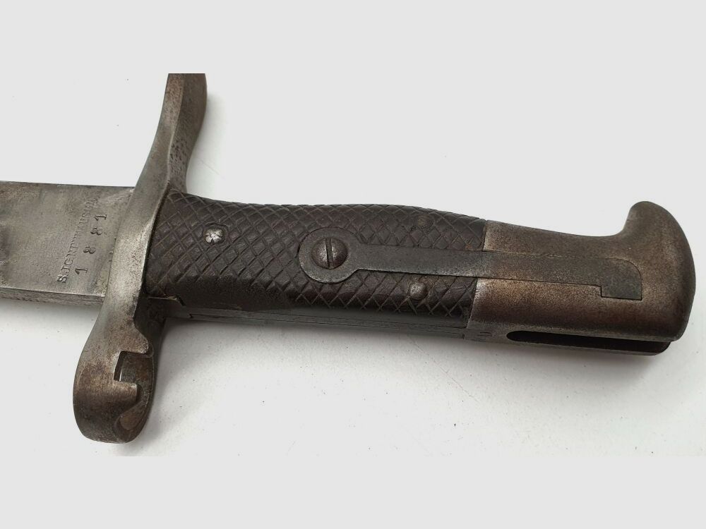 Vetterli original Vetterli bayonet with saw teeth and green fur on the scabbard