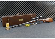 Fucile a canne sovrapposte di Ferlach, calibro 8×57 R‑360 / 16/65, cannocchiale Kahles Vienna H/4×, valigetta in pelle, matrici, bossoli e proiettili (173)