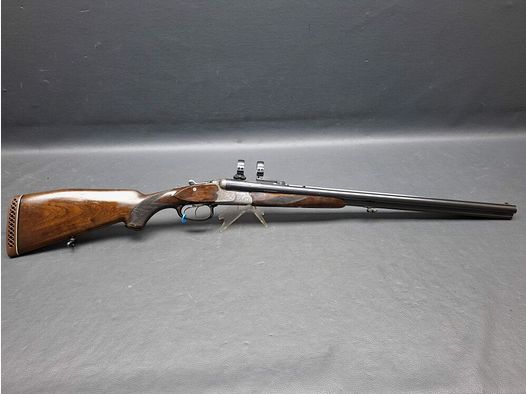 Drilling Sauer & Sohn con seguridad de percutor y montaje giratorio