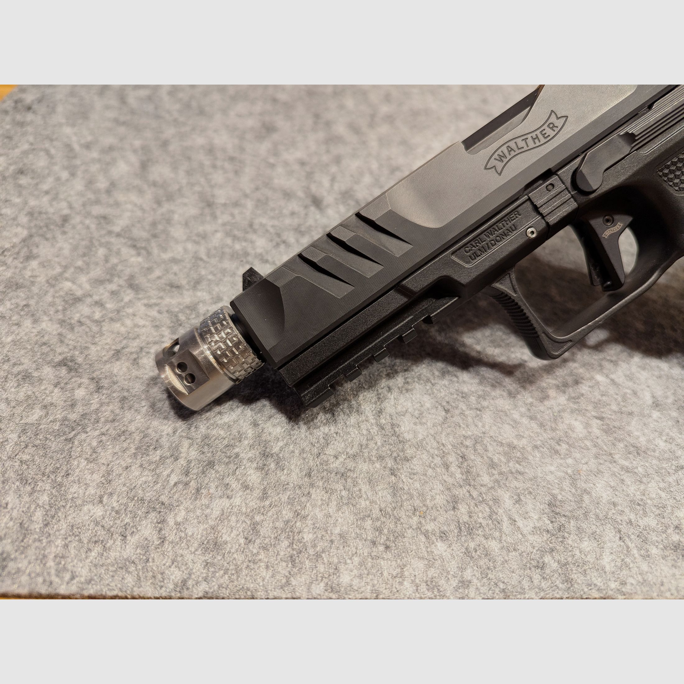 Walther PDP compensator vermindert recoil ook voor anderen.