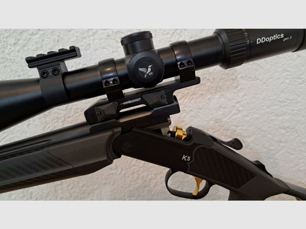 Merkel K5 Extrem mit FBT Carbon Lochschaft, DDOPTICS Zielfernrohr, Recknagel Schalldämpfer, Spartan Zweibein, Automatik Gewehrriemen, Luxus Koffer etc.