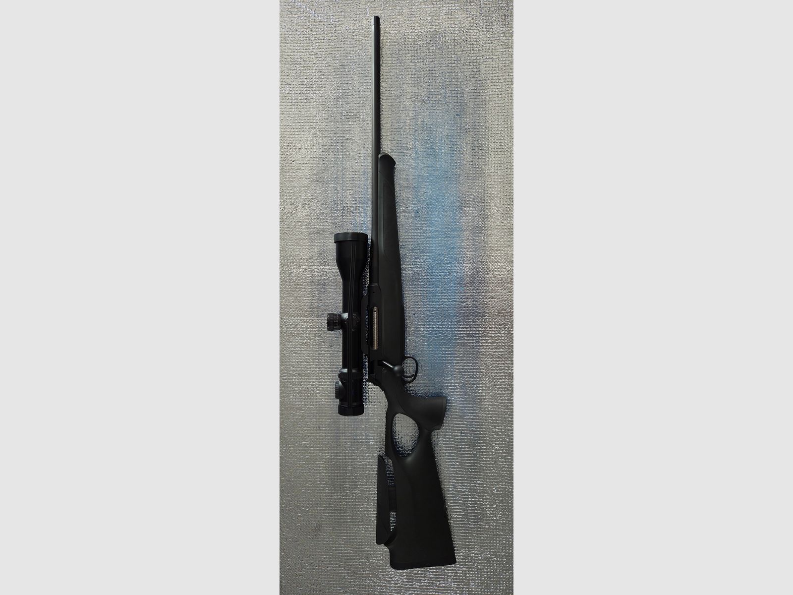 Sauer 404 Synchro XT (Sistema de acero) con mira telescópica y silenciador