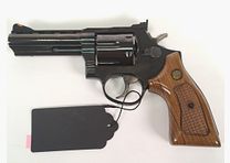 Taurus revolver .357 Magnum – blued with wooden grip