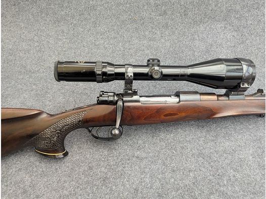 Mauser Mod 98 with animal engraving and stalking safety