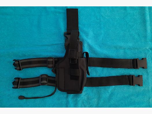 Tactical thigh holster