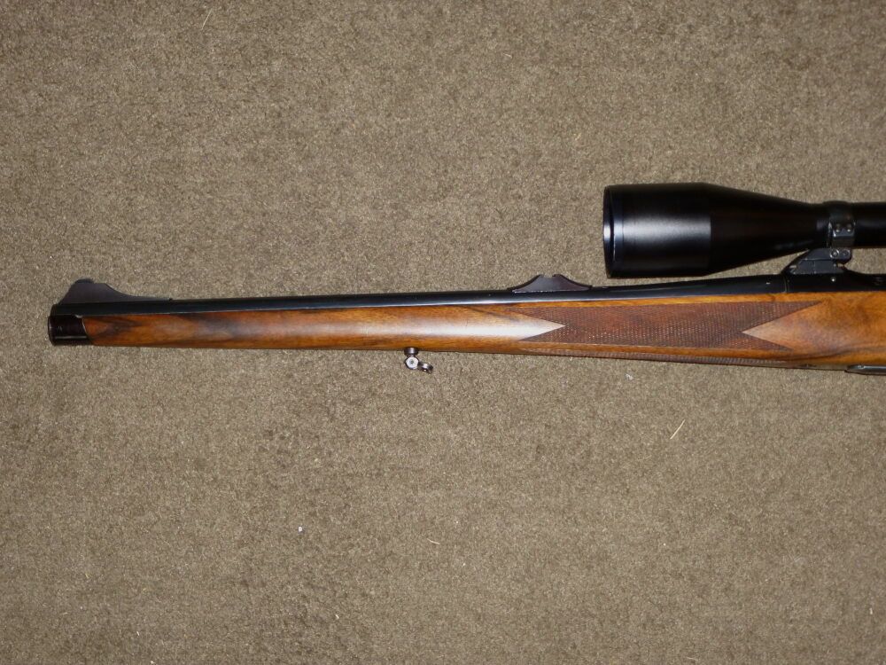 Sauer & Sohn 90, carabina, zur izquierda