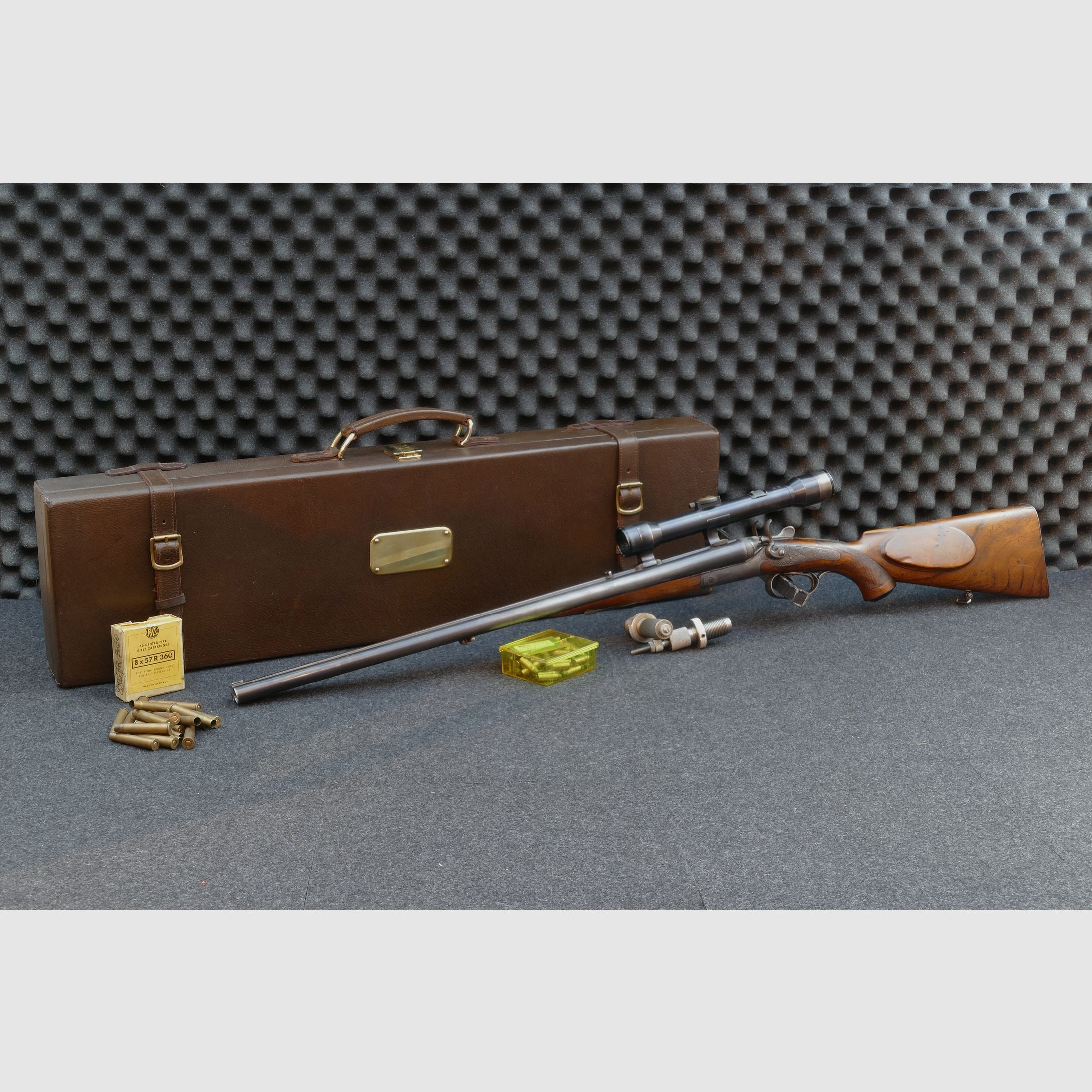 Fucile a canne sovrapposte di Ferlach, calibro 8×57 R‑360 / 16/65, cannocchiale Kahles Vienna H/4×, valigetta in pelle, matrici, bossoli e proiettili (173)