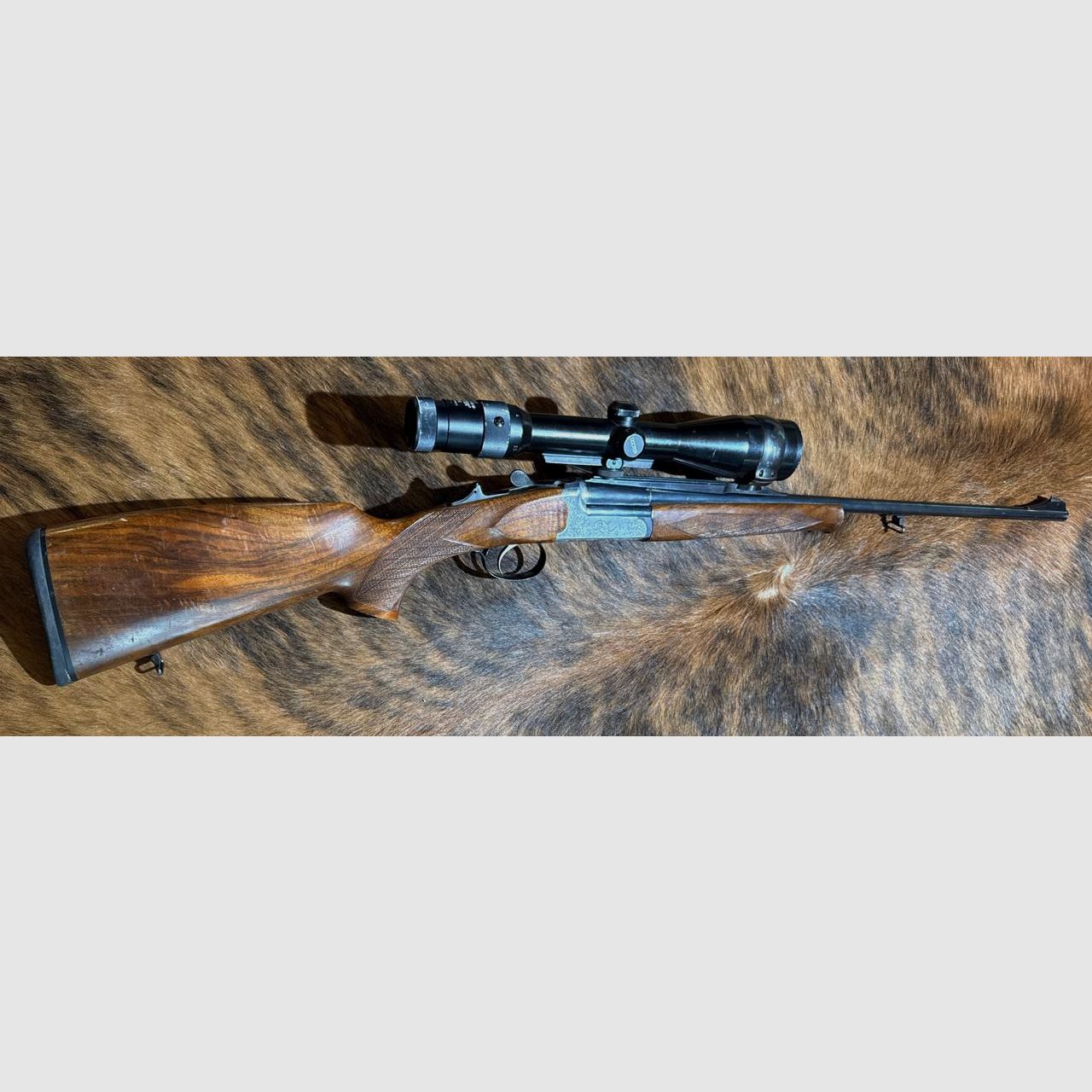 SABATTI SKL 98 DL rifle de un solo tiro de cerrojo calibre 6,5x57R con óptica de mira Docter 2,5-10x48, retícula 4