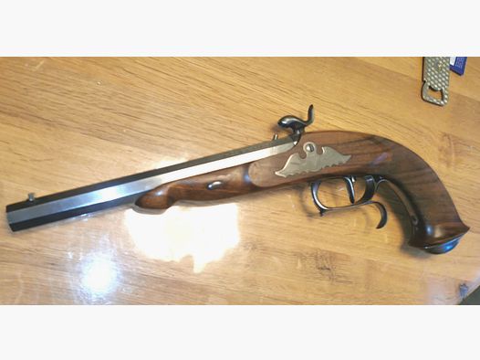 The Page Target percussion pistol by Petersoli caliber .44 free from 18 years unused!