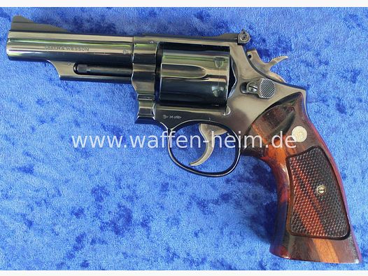 Smith & Wesson	 19 - 3 / 4"