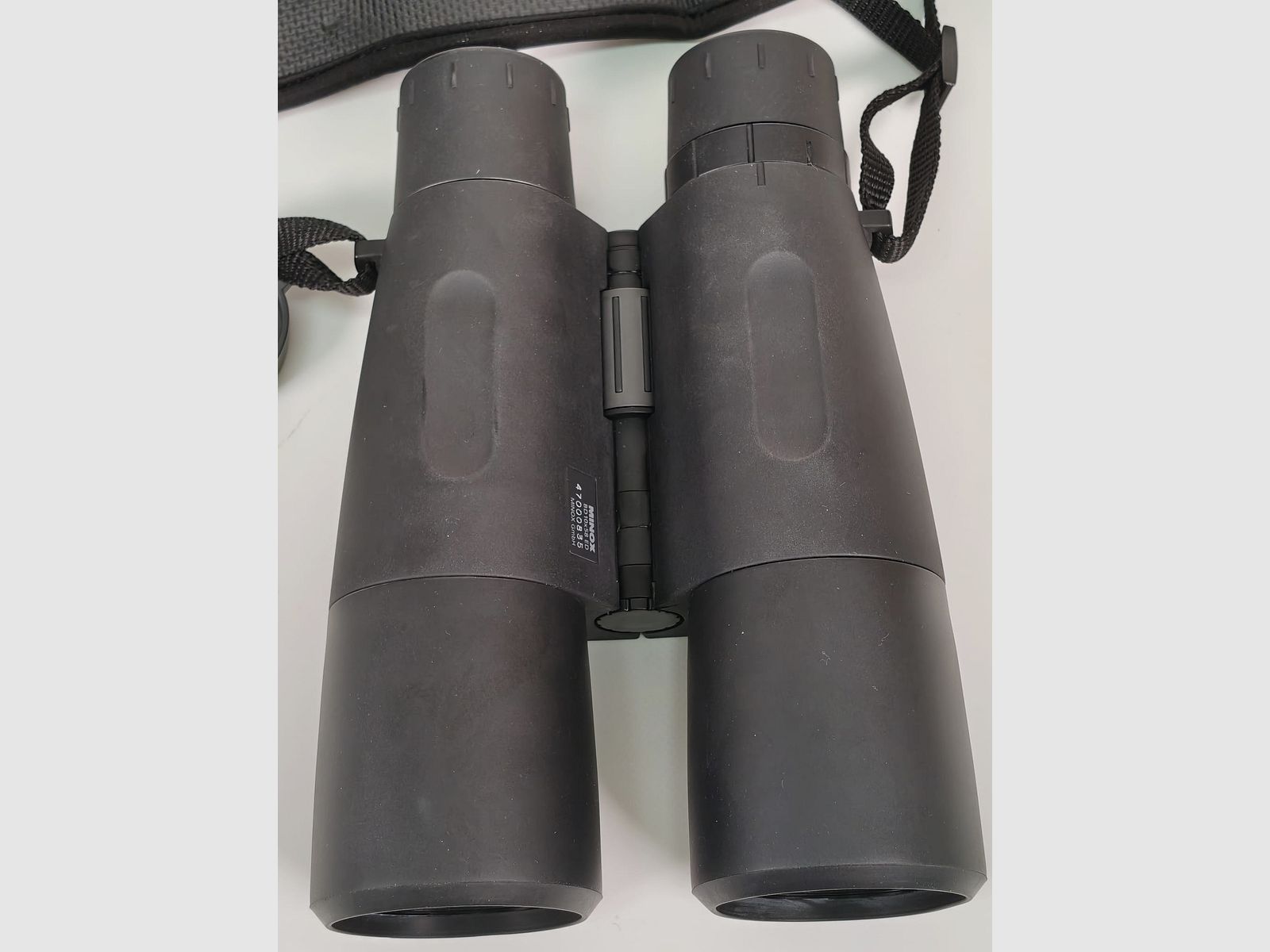 Minox BD 10x58 ED inkl. Riemen und Tasche