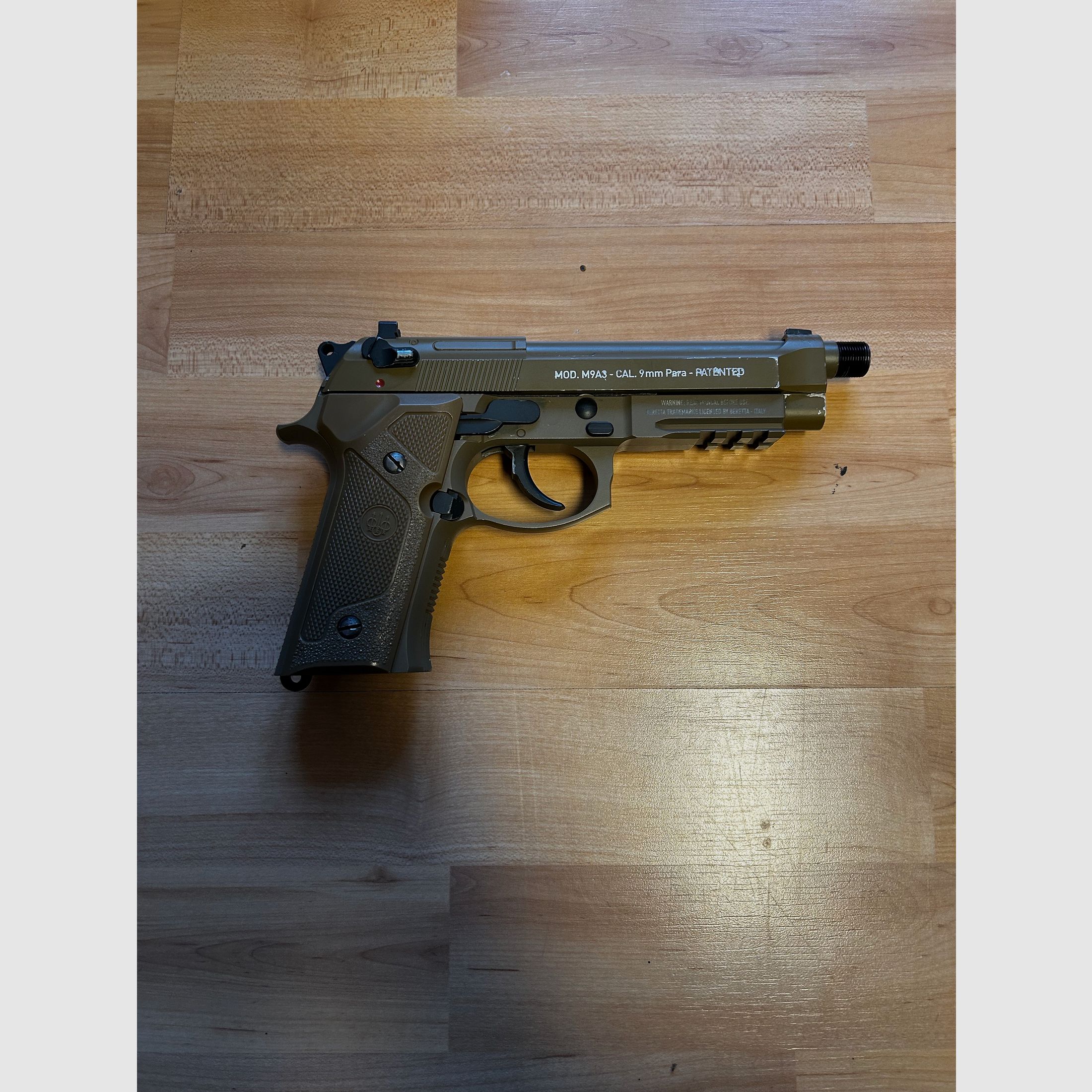 Beretta Airsoft – Coyote, used with silencer