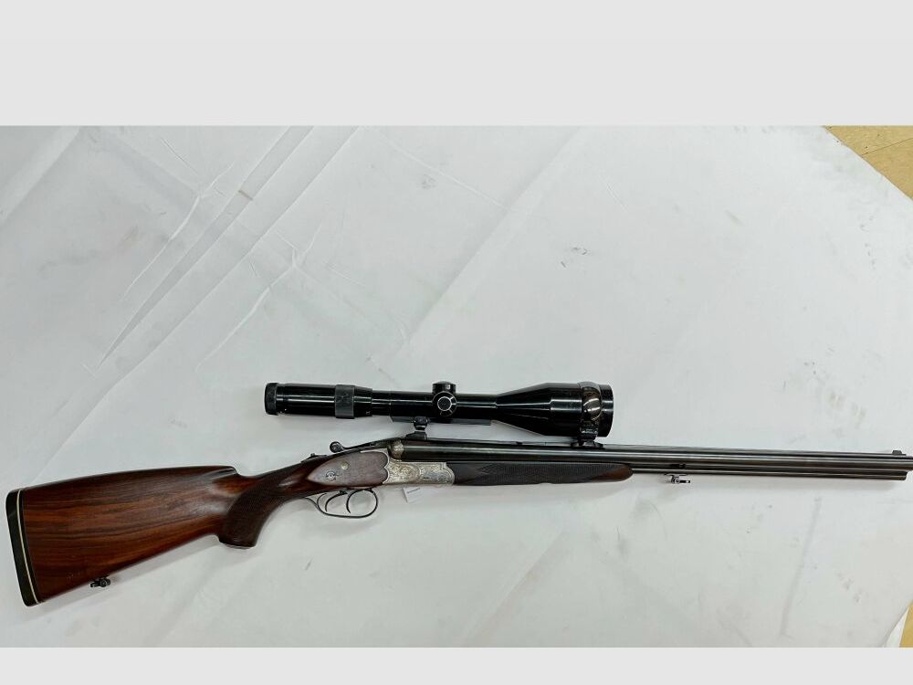 Sauer & Sohn Drilling Kal. 8x57 IRS, 16/70 Einstecklauf .22 Hornet