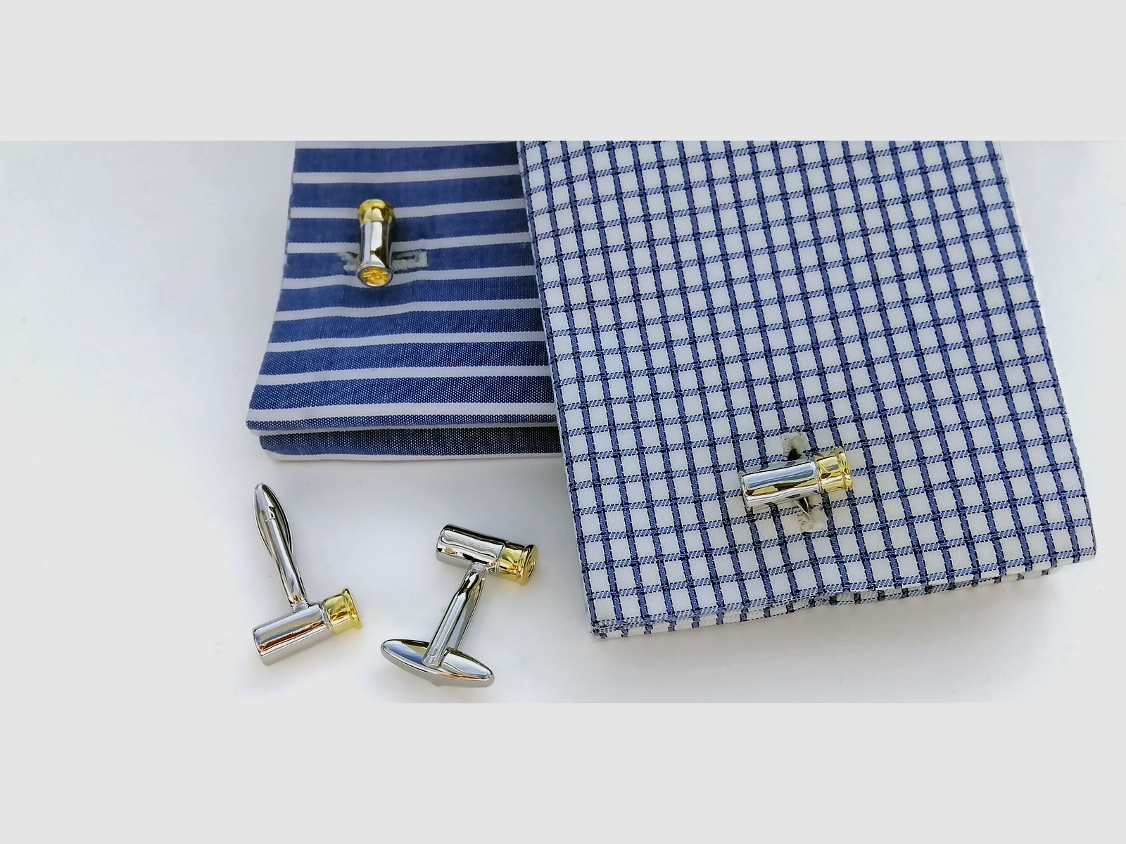 <Cufflinks in shotgun cartridge design>