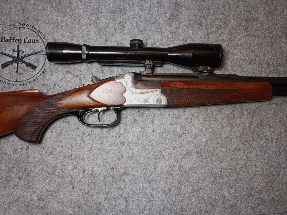 Escopeta de doble cañón Meuter Solingen similar al modelo Heym 55 con mira 6x42