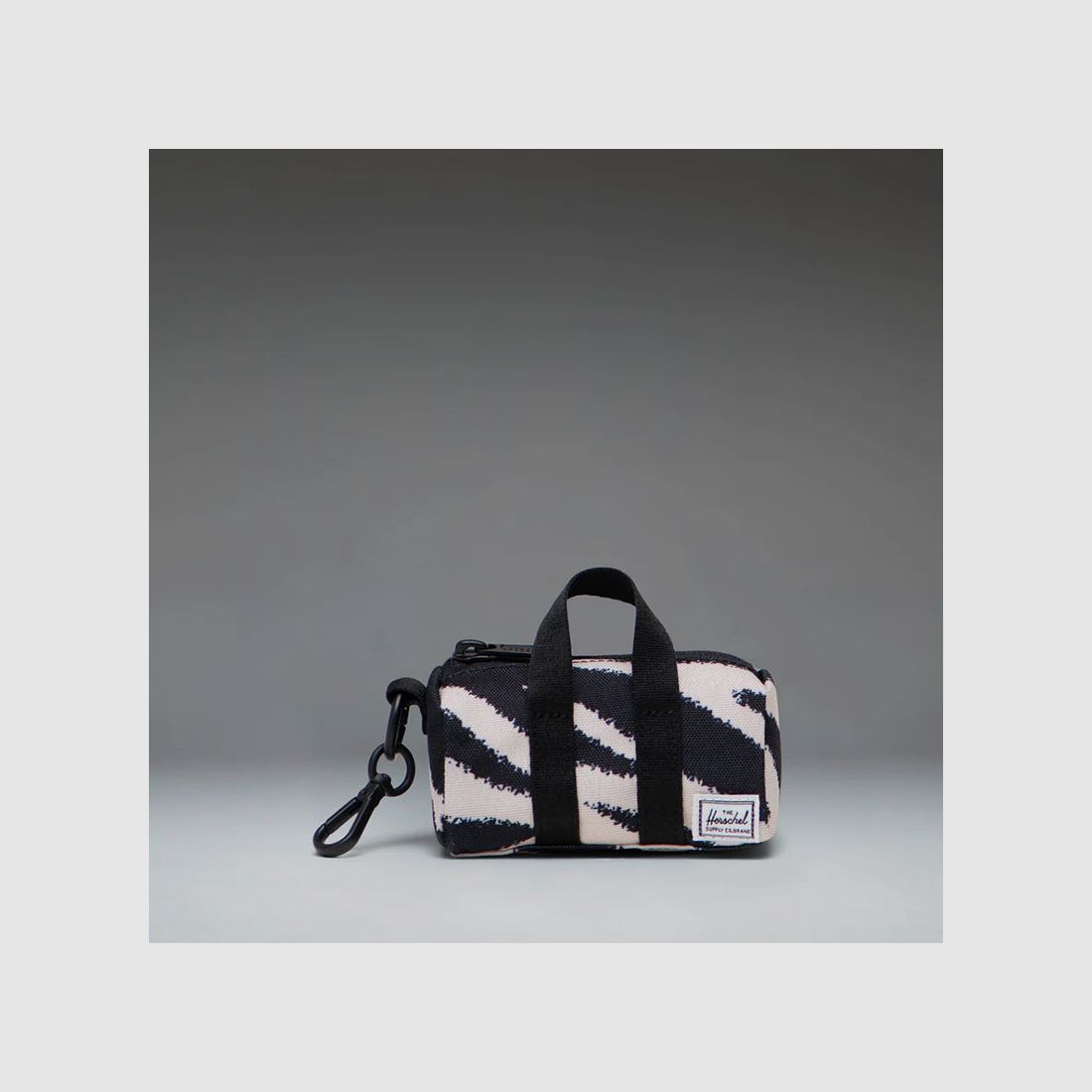 KEYCHAIN – HERSCHEL – NOVEL™ DUFFLE BAG CHARM | Zebra, image 2 of 2