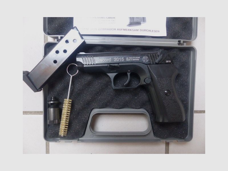 Record 2015 Cal. 9mm PAK New with case, blank firing adapter, brush, manual from collection plus 50 rounds of ammunition