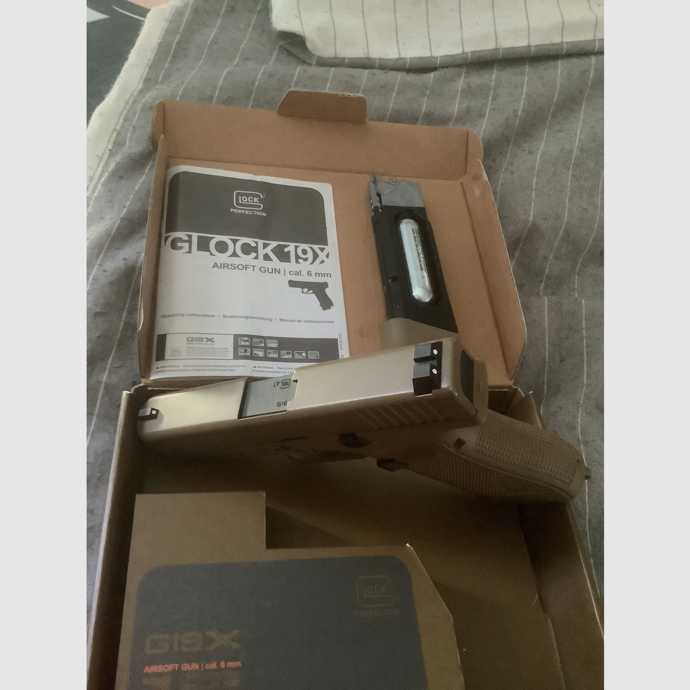 Umarex Glock 19X CO2. Pistole Coyote 19 Schuss