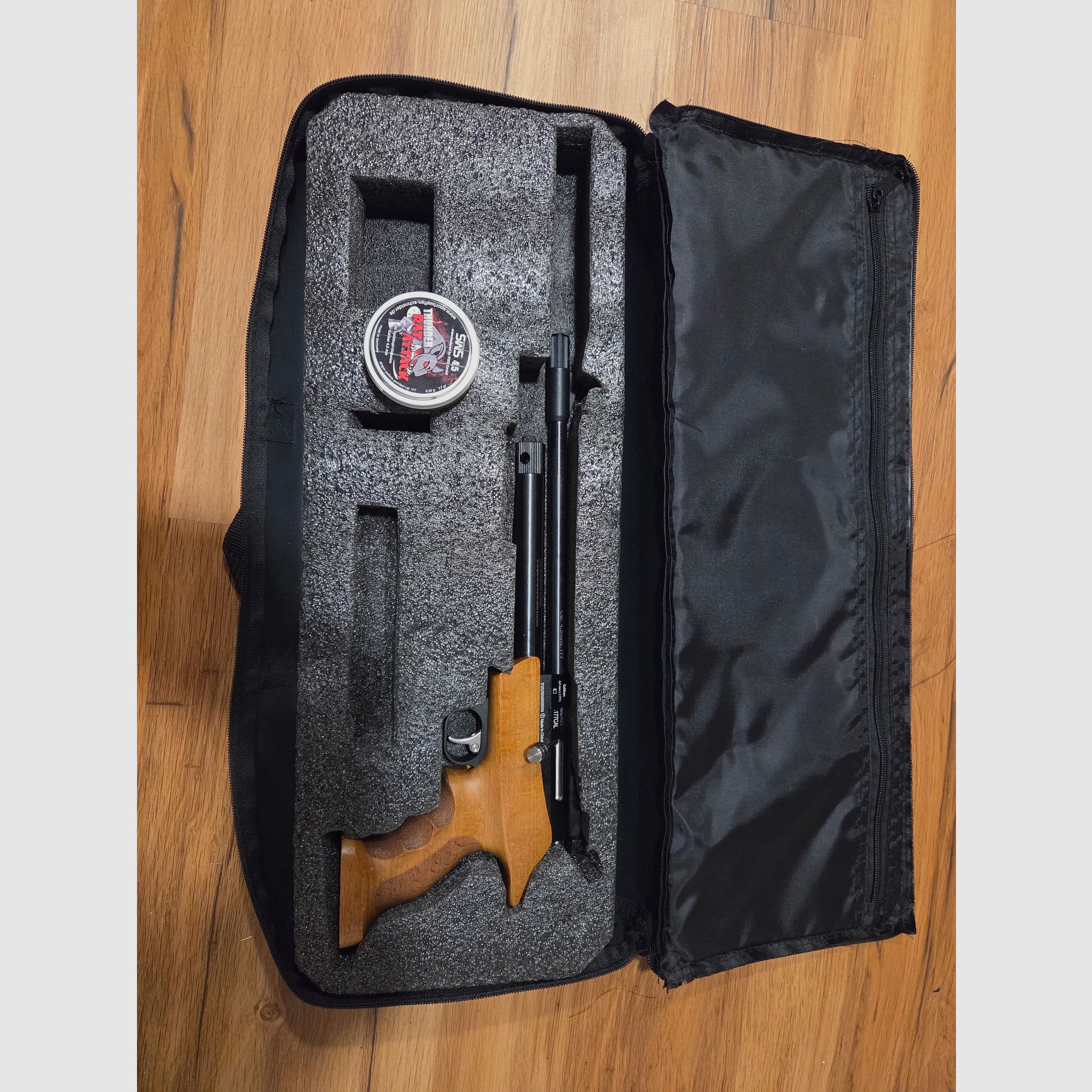 Diana Chaser with wooden handle and a pack of diabolos