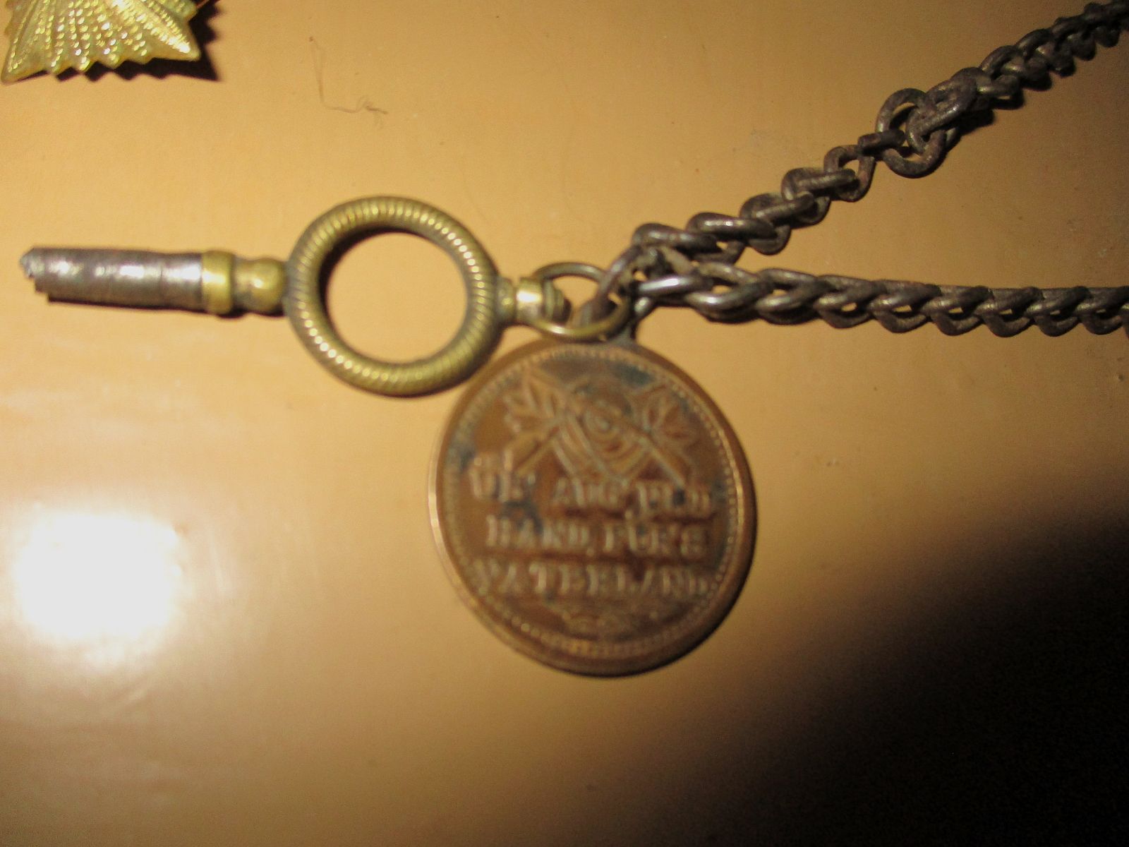 Swiss army knife, among other things, old metal ammunition box, medal on chain, among other things, military