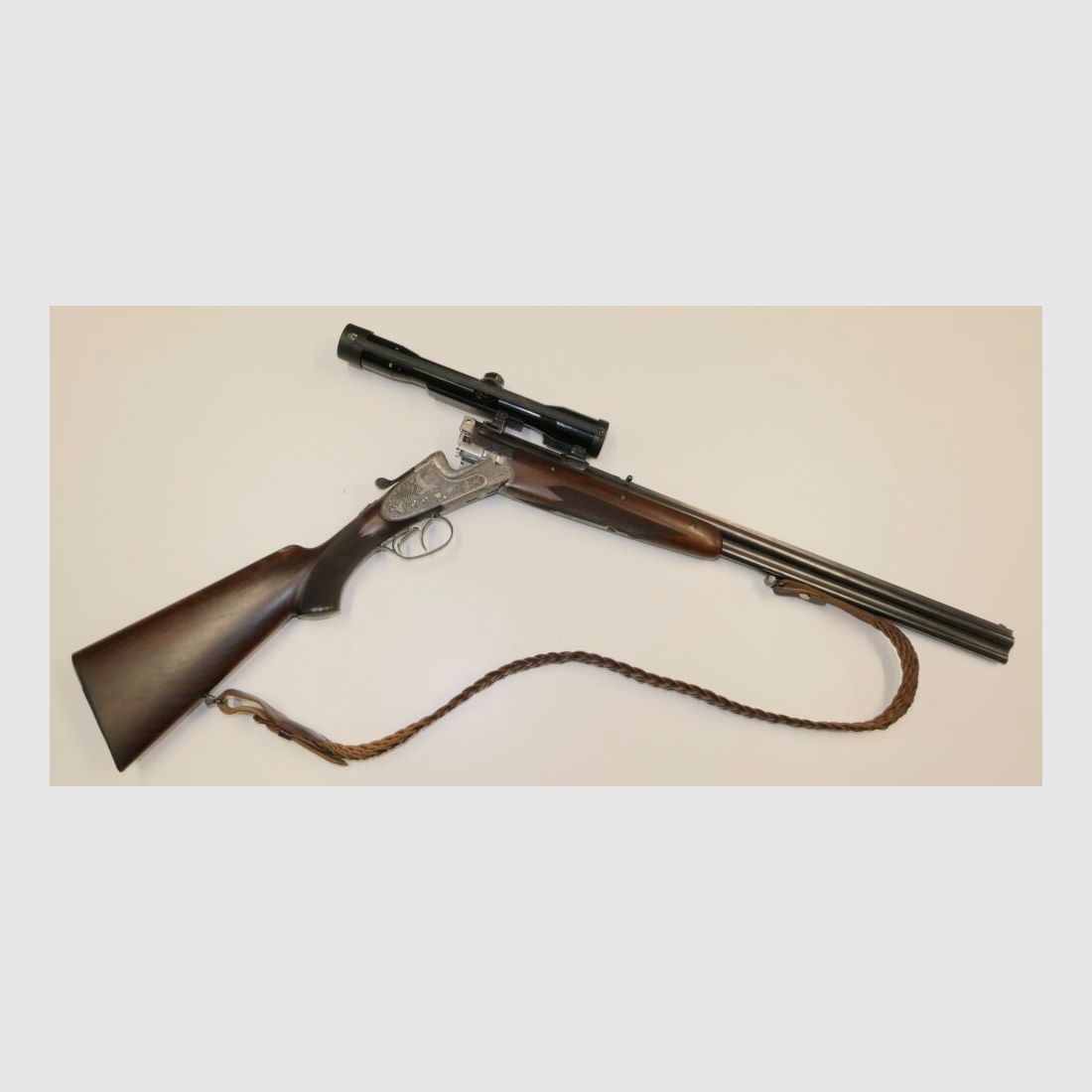 Merkel E313 mit jagdlichen Tiergravuren
