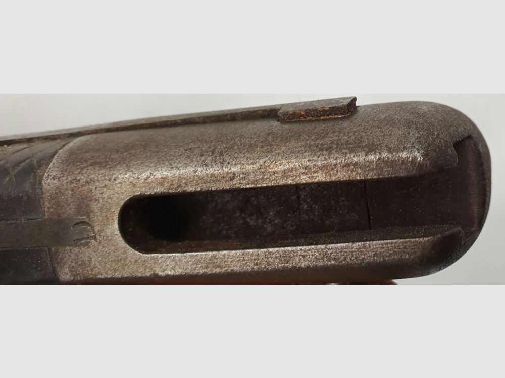 Vetterli original Vetterli bayonet with saw teeth and green fur on the scabbard