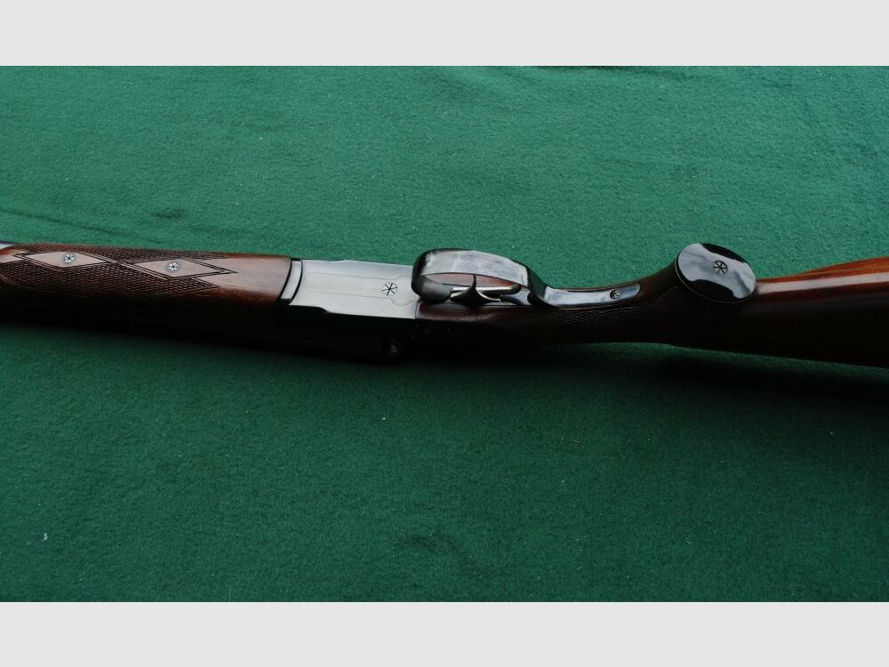 CAS escopeta de caza, auténticos cerrojos laterales, sin extractores, seguro manual.