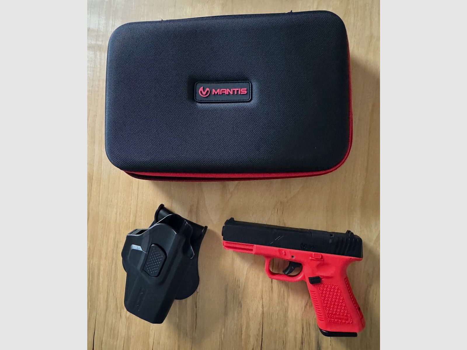 Mantis Titan X 701 laser dry-fire training pistol (like Glock 19)