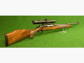 SAUER 303 ELEGANCE Cal. 30-06 Sauer + montura original Sauer ISI + Meopta Meostar R1 1-4x22 RD K-DOT iluminado Top arma de caza de presión