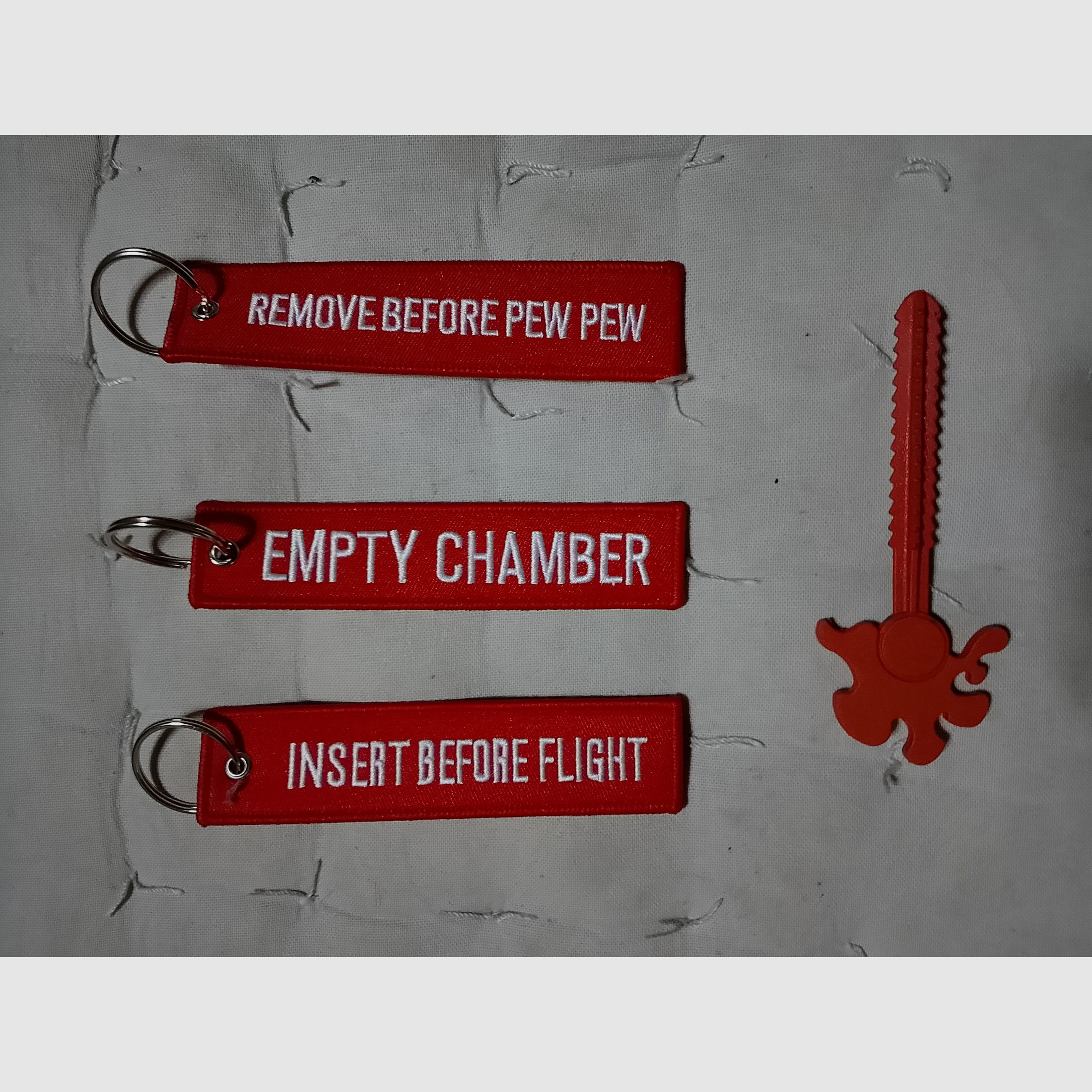 Ram Transport Bouchon Rouge pour Marqueurs Paintball Canon Bouchon cal 43 Universel + 3 Porte-clés avec des Citations