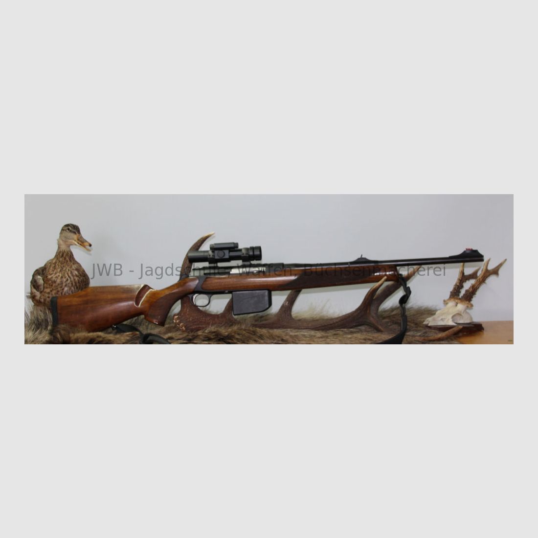 Sauer 303 mit Aimpoint 5000 303 Classic