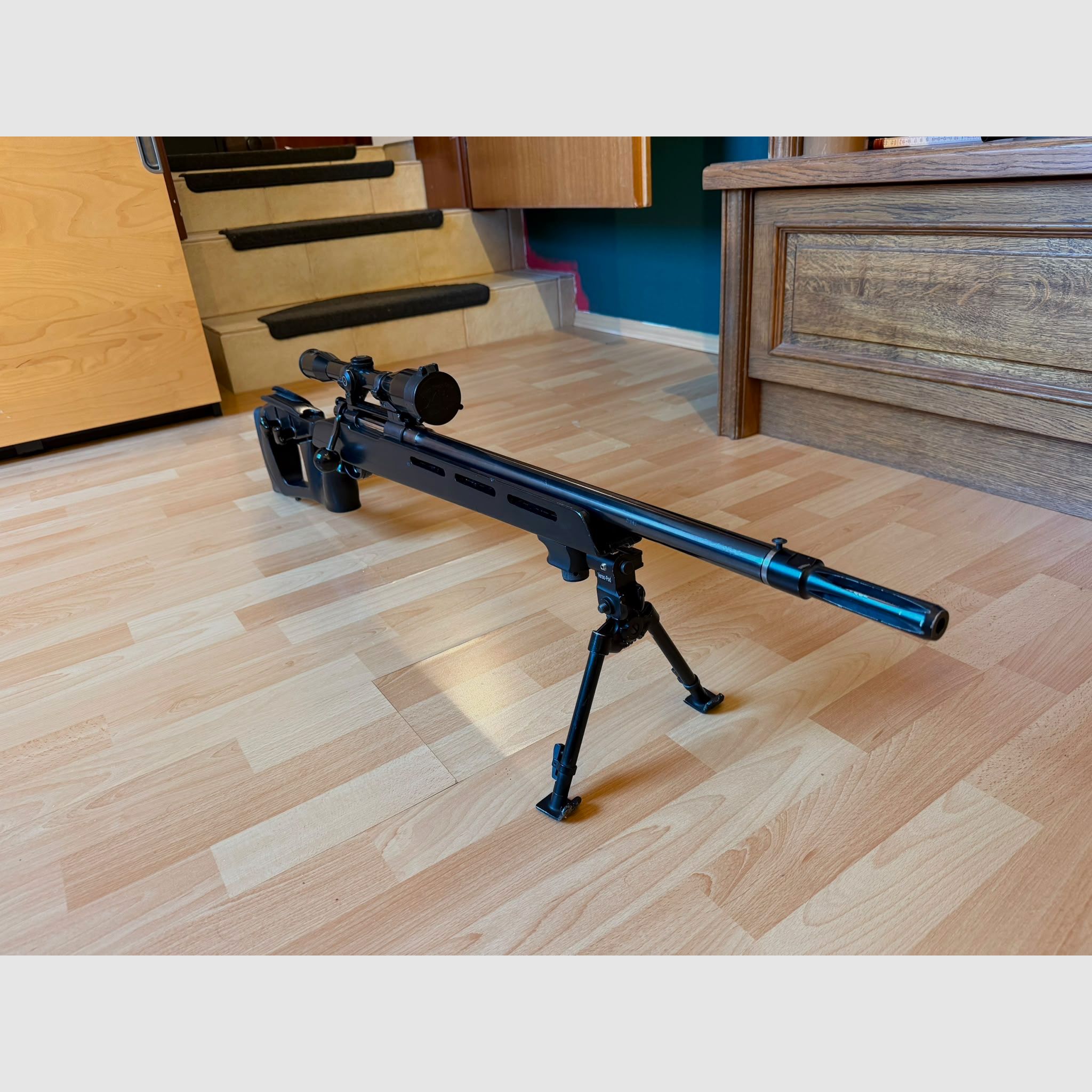 Sporting bolt-action rifle based on FN 30-11 Belgian sniper rifle for right- and left-handed shooters