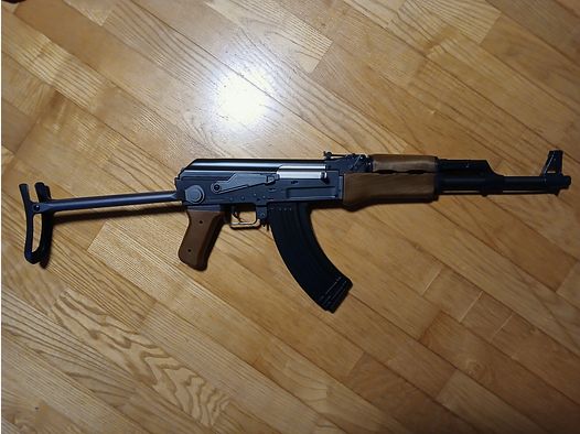 AK con resorte de pluma